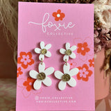 Foxie Collective double daisy dangle earrings